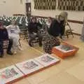 Helen dishes out the pizzas, The Dove Players do Puss in Boots, Occold, Suffolk - 13th January 2024