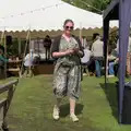 Isobel returns from a food order, LowFest at the Low House, Laxfield, Suffolk - 26th May 2024