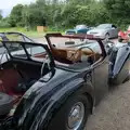 Isobel takes a photo of a lovely roadster, Saxtead Mill, Framlingham Gala and Chips on the Beach, Aldeburgh - 27th May 2024