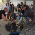 It's all action in the farrier competition, Fred and the SYWO at the Suffolk Show, Trinity Park, Ipswich - 30th May 2024