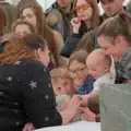 A baby gets a go of a rabbit, Fred and the SYWO at the Suffolk Show, Trinity Park, Ipswich - 30th May 2024