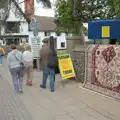 We head off past a Persian rug sale, A "Once" Photoshoot, Diss, Norfolk - 8th June 2024