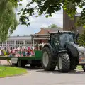 A tractor and trailer outside Diss High School, The Carnival Procession, Diss, Norfolk - 16th June 2024