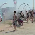 Spray misters offer a brief respite from the sun, Hannah and Olympic ILCA 6 Sailing, Marseille, France - 5th August 2024