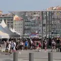 A throng of people is reflected on a shiny roof, Olympic Non-Sailing, Notre Dame, and the Journey Home, Marseille, France - 8th August 2024