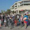 Crowds cross the road near the InterMarché, Olympic Non-Sailing, Notre Dame, and the Journey Home, Marseille, France - 8th August 2024