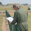 The Spitfire pilot updates his logbook, Flying in a Dragon Rapide, IWM Duxford, Cambridgeshire - 17th August 2024