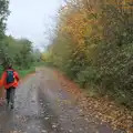 Isobel strides up an autumnal lane to Warren Hills, A Quiz at Diss Golf Club, Stuston - 18th October 2024