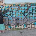 Isobel peers at a hidden derelict building, A Return to Girona, Catalunya, Spain - 29th October 2024