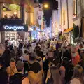 The crowds head off up Calle de San Román, Halloween and Flamenco Guitar, Lloret de Mar, Catalunya, Spain - 31st October 2024