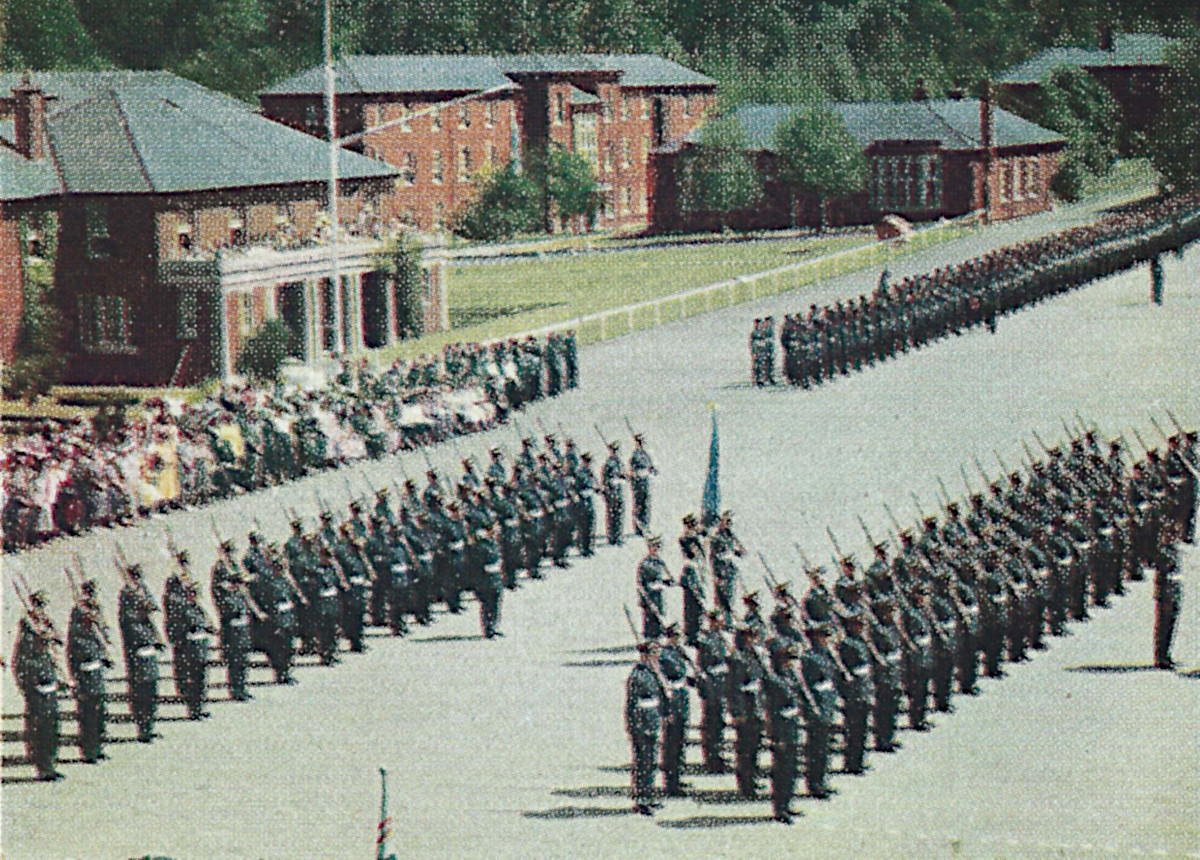 Ranks of apprentices, including the 69th, stand to attention