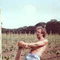 Mike pulls more wires, Constructing a Vineyard, Harrow Road, Bransgore, Dorset - 1st September 1981