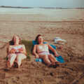 Camping with Sean, The Camargue, South of France, 15th July 1982, Jean and Pam catch a few rays on the beach