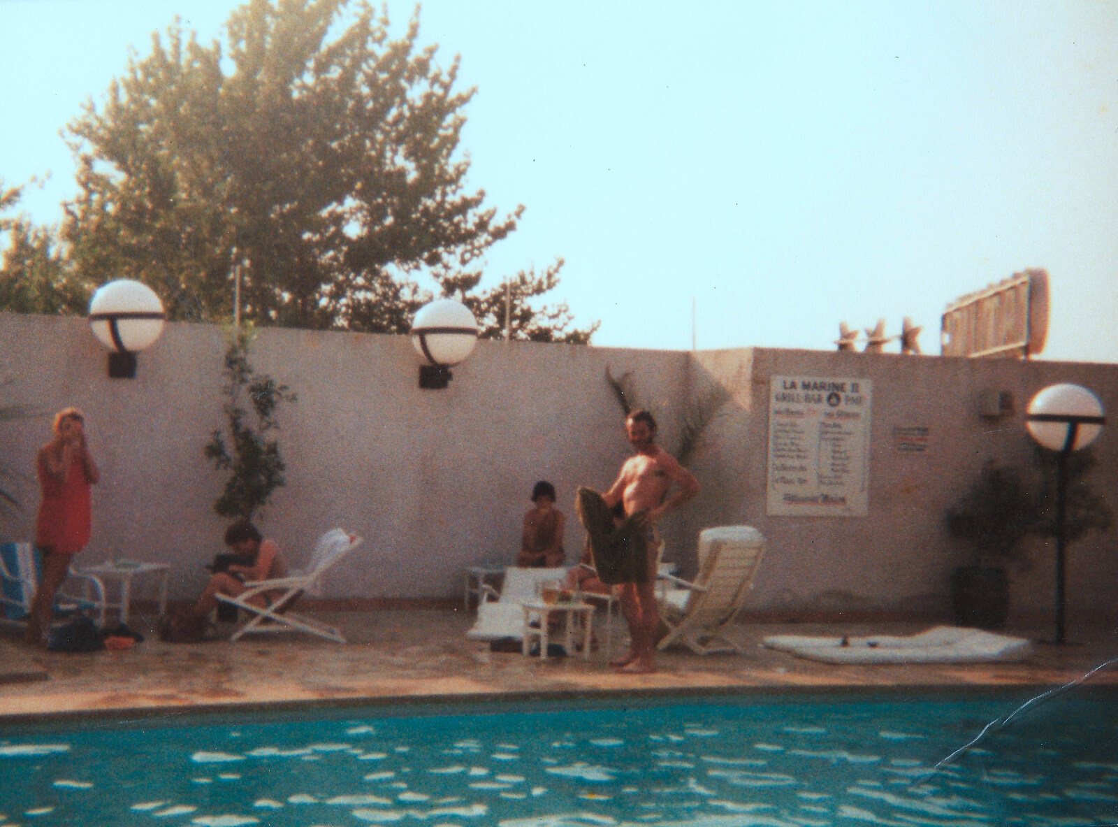 Dave by the side of La Marine II's pool from Camping with Sean, The Camargue, South of France, 15th July 1982