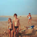 Camping with Sean, The Camargue, South of France, 15th July 1982, Nosher and Sean in a hole on the beach
