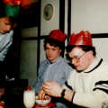 Hamish learns how to peel prawns for the first time ever. Andy Poppit and Steve look on