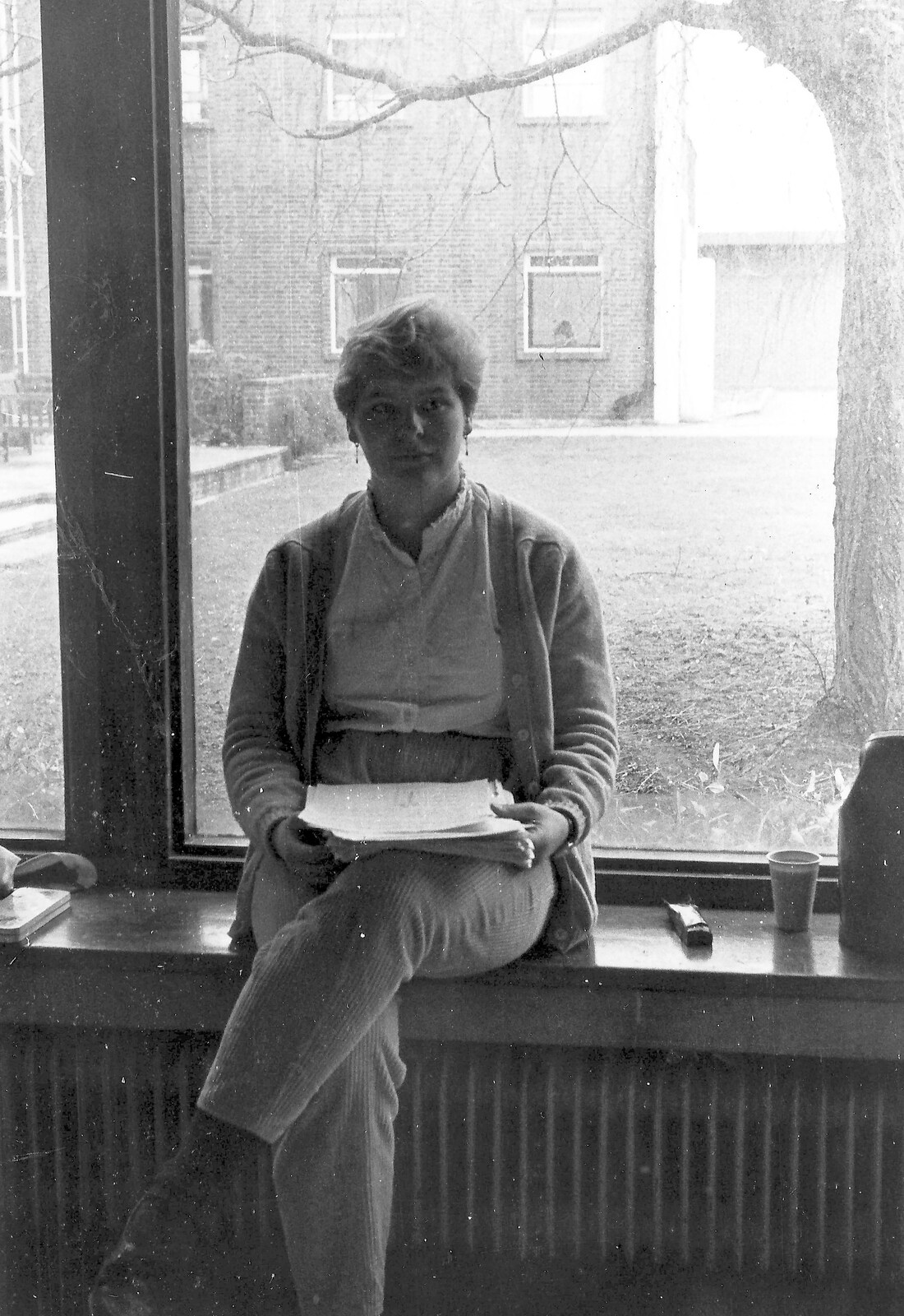 Anna Green sits on a windowsill outside the main hall from Learning Black-and-White Photography, Brockenhurst College, Hampshire - 10th March 1985