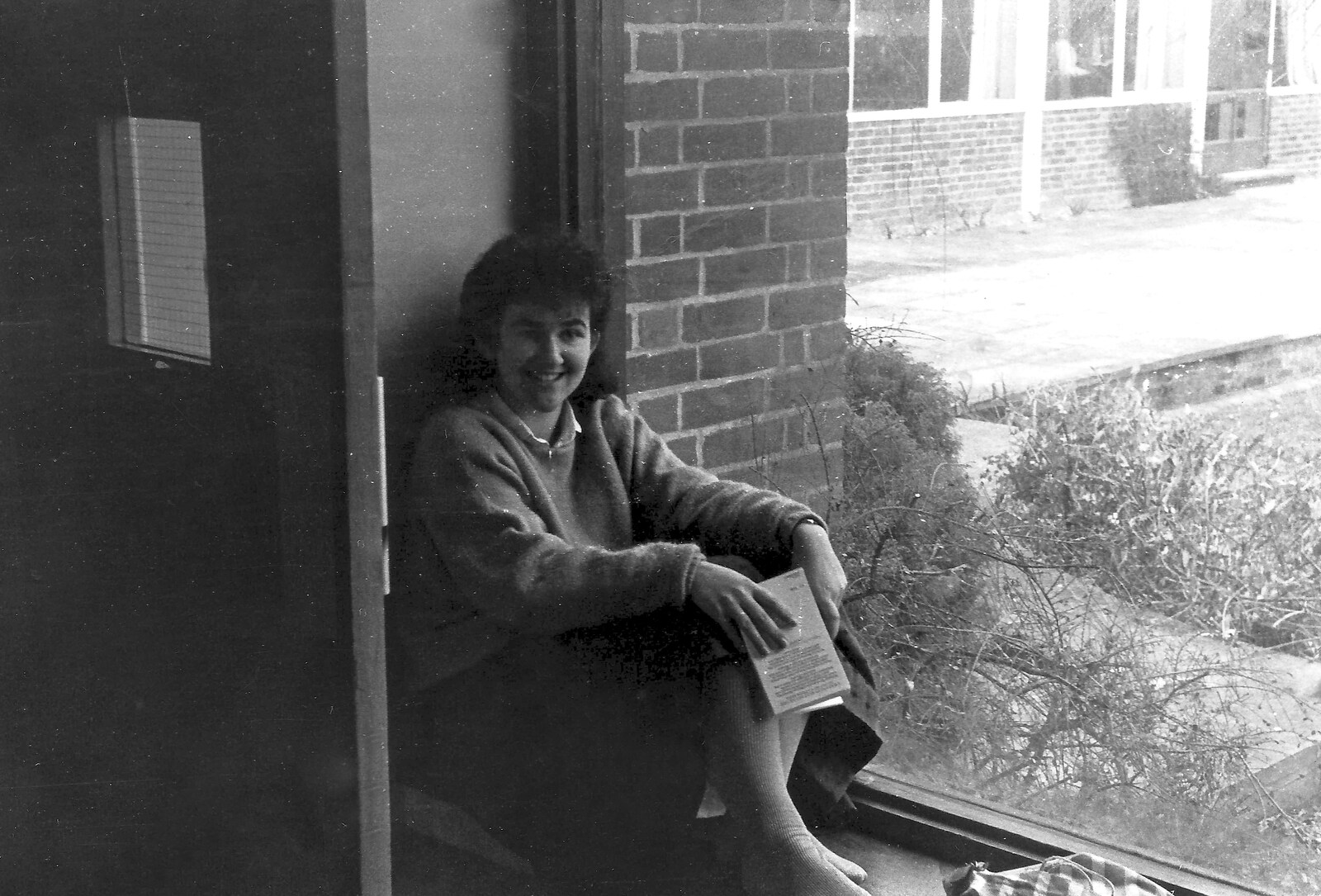 Liz sits by the window from Learning Black-and-White Photography, Brockenhurst College, Hampshire - 10th March 1985