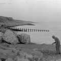 An old dude does metal detectoring on Barton beach, Life in Ford Cottage and Barton on Sea, Hampshire - 2nd April 1985