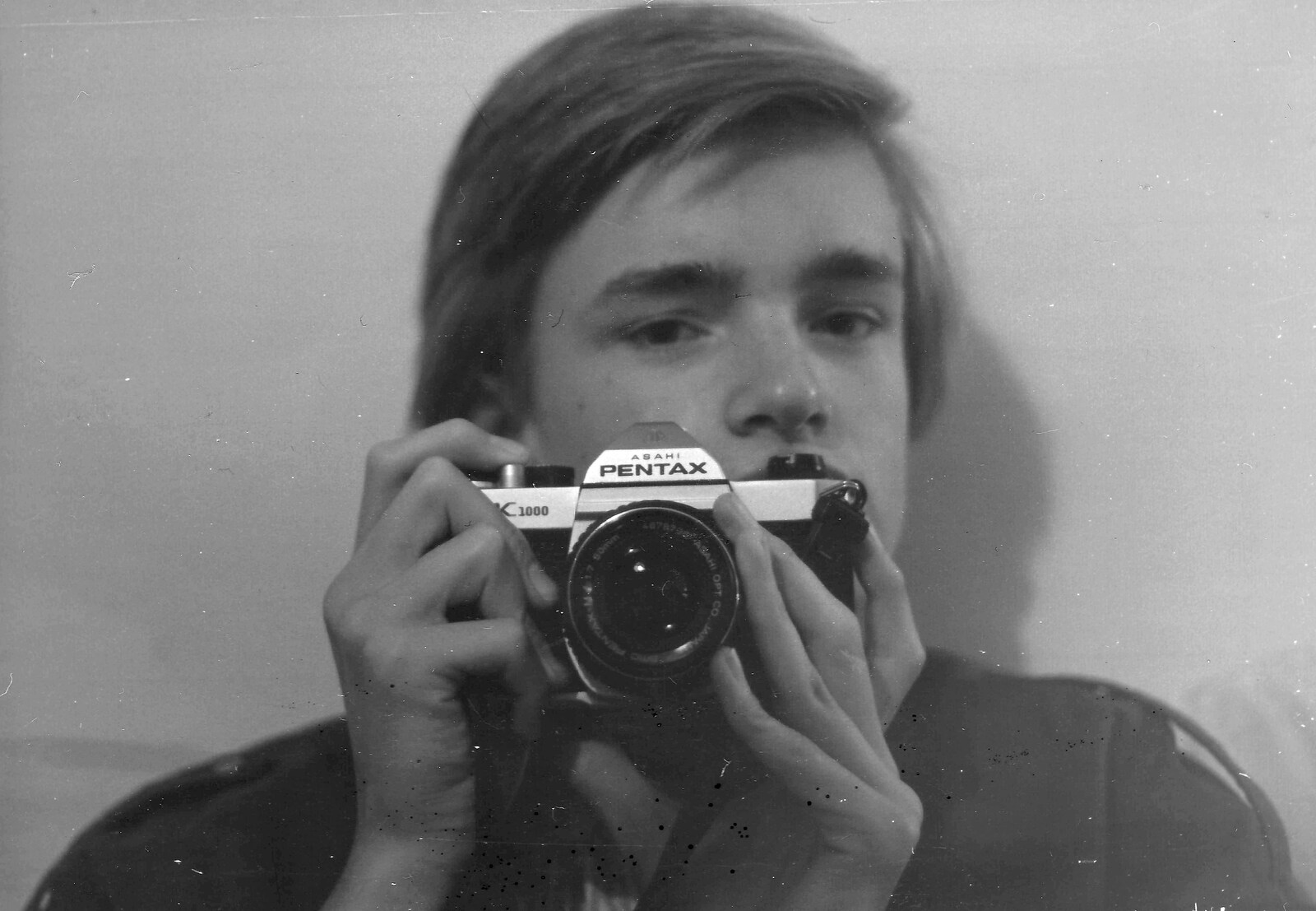 Nosher does a selfie in the bedroom mirror from Life in Ford Cottage and Barton on Sea, Hampshire - 2nd April 1985