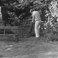 Fleabag scratches a flea as Andy sweeps, Life in Ford Cottage and Barton on Sea, Hampshire - 2nd April 1985