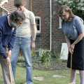 Andy and Sis are head-to-head on the croquet, Nosher's 18th Birthday, Barton on Sea, Hampshire - 26th May 1985