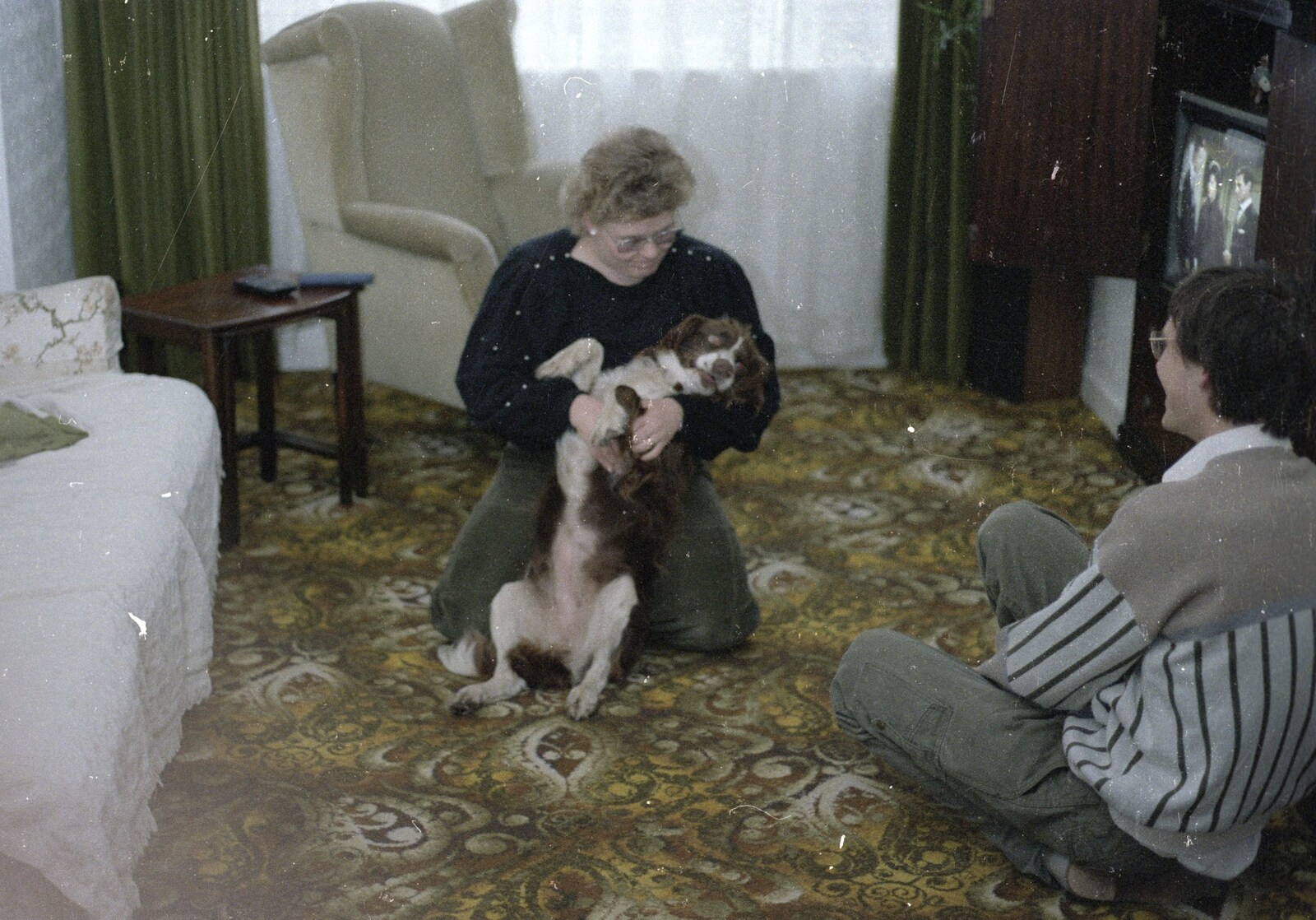 Anna's sister, Nikki, plays with Sally the dog from Brockenhurst College Exams and Miscellany, Barton on Sea, Hampshire - 10th June 1985
