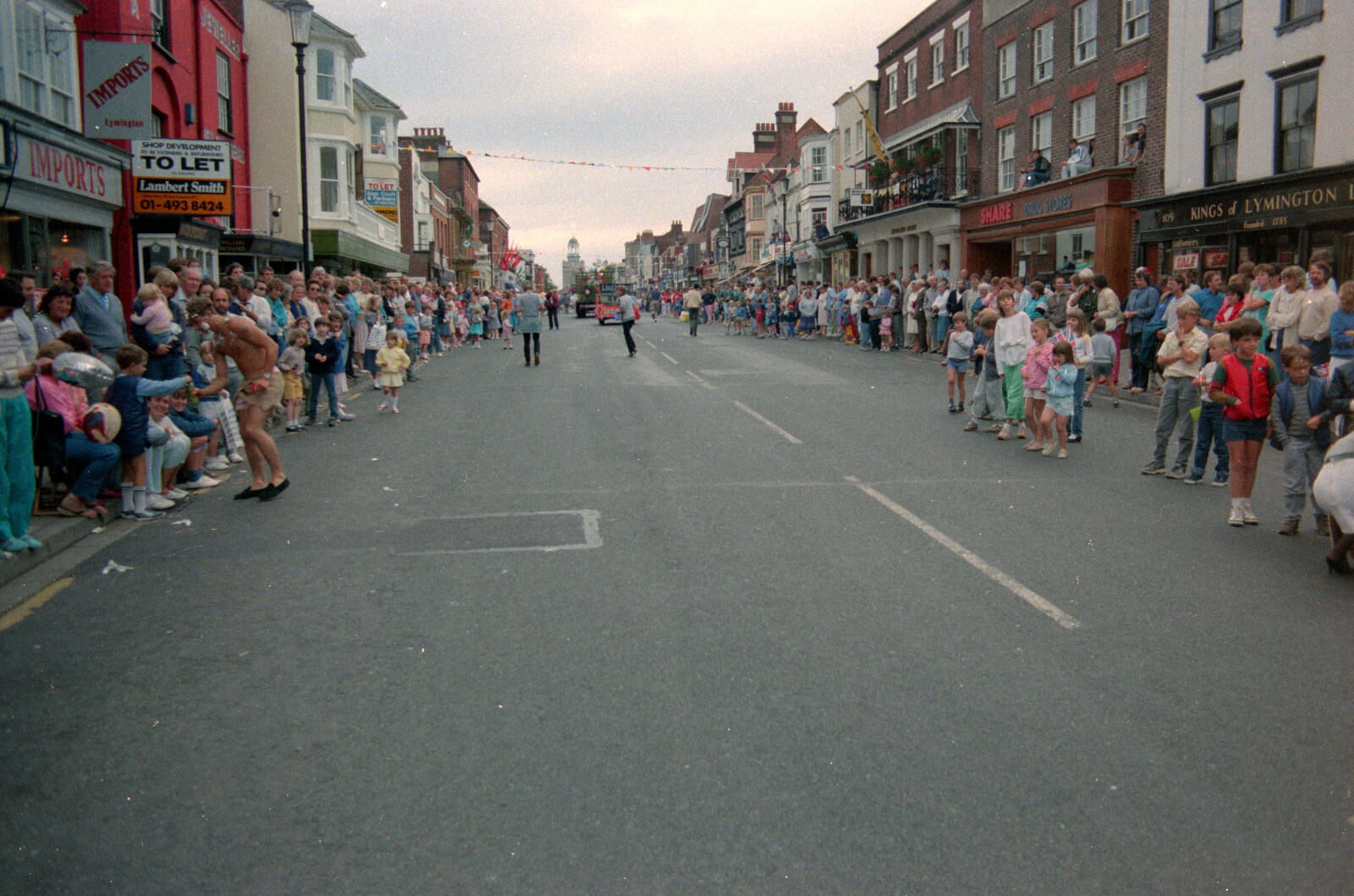 The crowds wait for the carnival on Lymington High Street from The Lymington Carnival, Hampshire - 17th June 1985