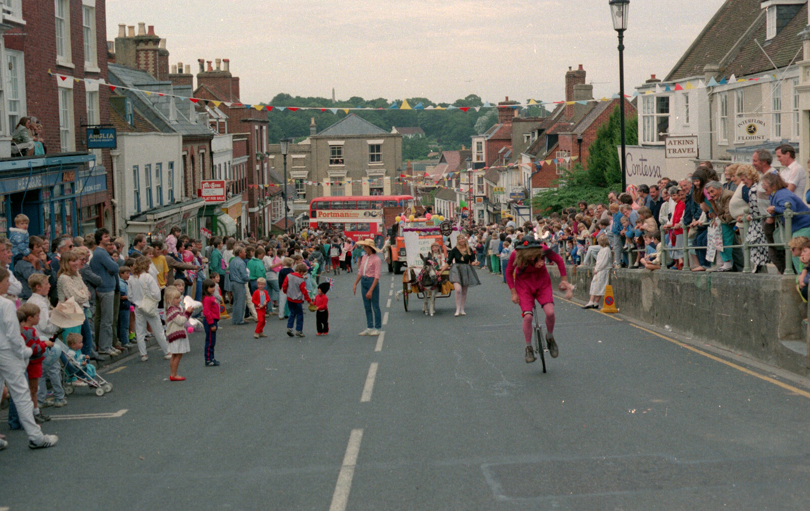 Scene on the High Street from The Lymington Carnival, Hampshire - 17th June 1985