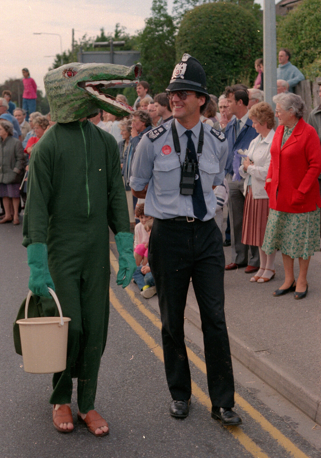 A crocodile talks to a beat copper from The Lymington Carnival, Hampshire - 17th June 1985