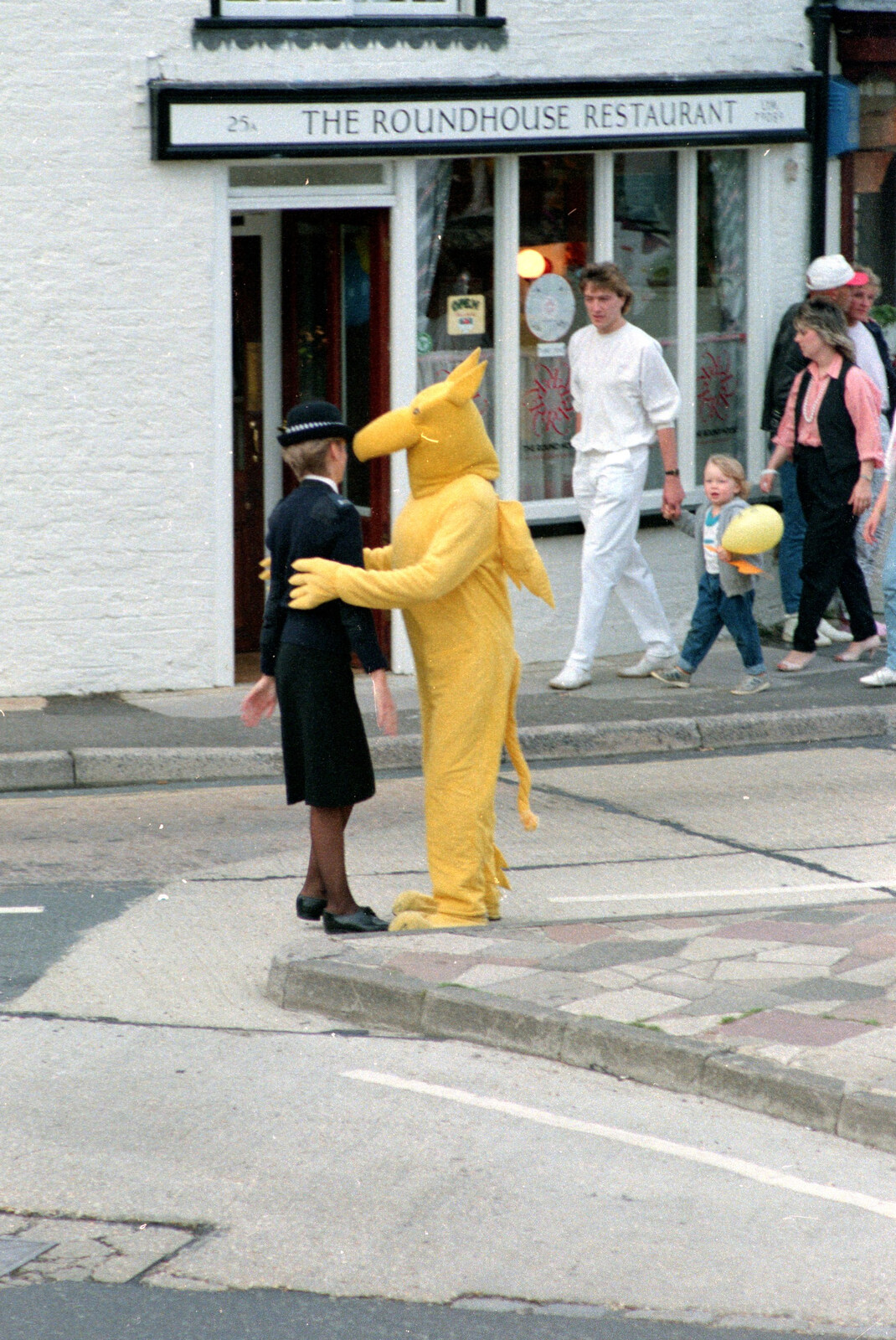 The Midland Bank griffin accosts a traffic warden from The Lymington Carnival, Hampshire - 17th June 1985