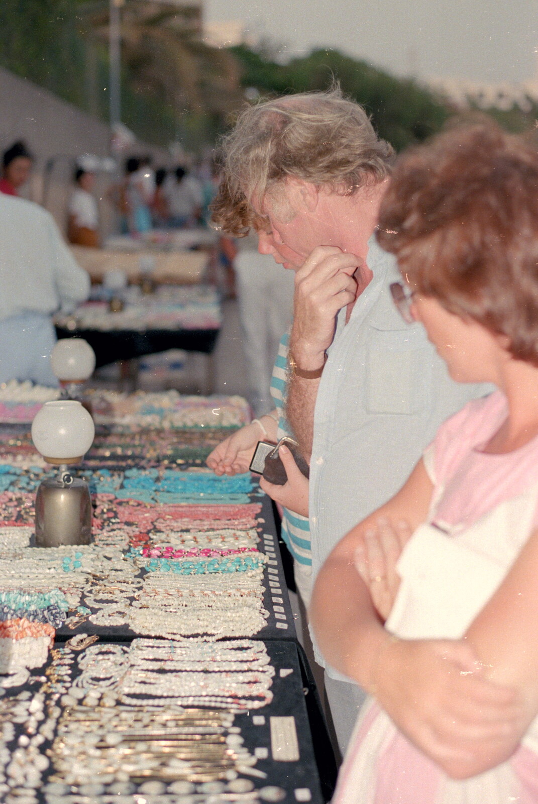 Browsing some sort of tat market from A Holiday in Los Christianos, Tenerife - 19th June 1985