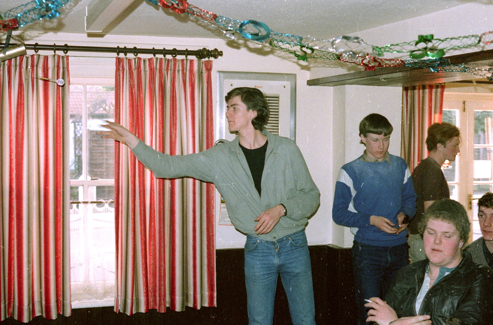 Keith Frost throws a dart in the pub from The Last Day of Term, and Leaving New Milton, Hampshire - 18th September 1985