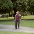 Some old geezer roams around with a stick, Uni: A Central Park Fair and City Street Life, Plymouth - 20th October 1985