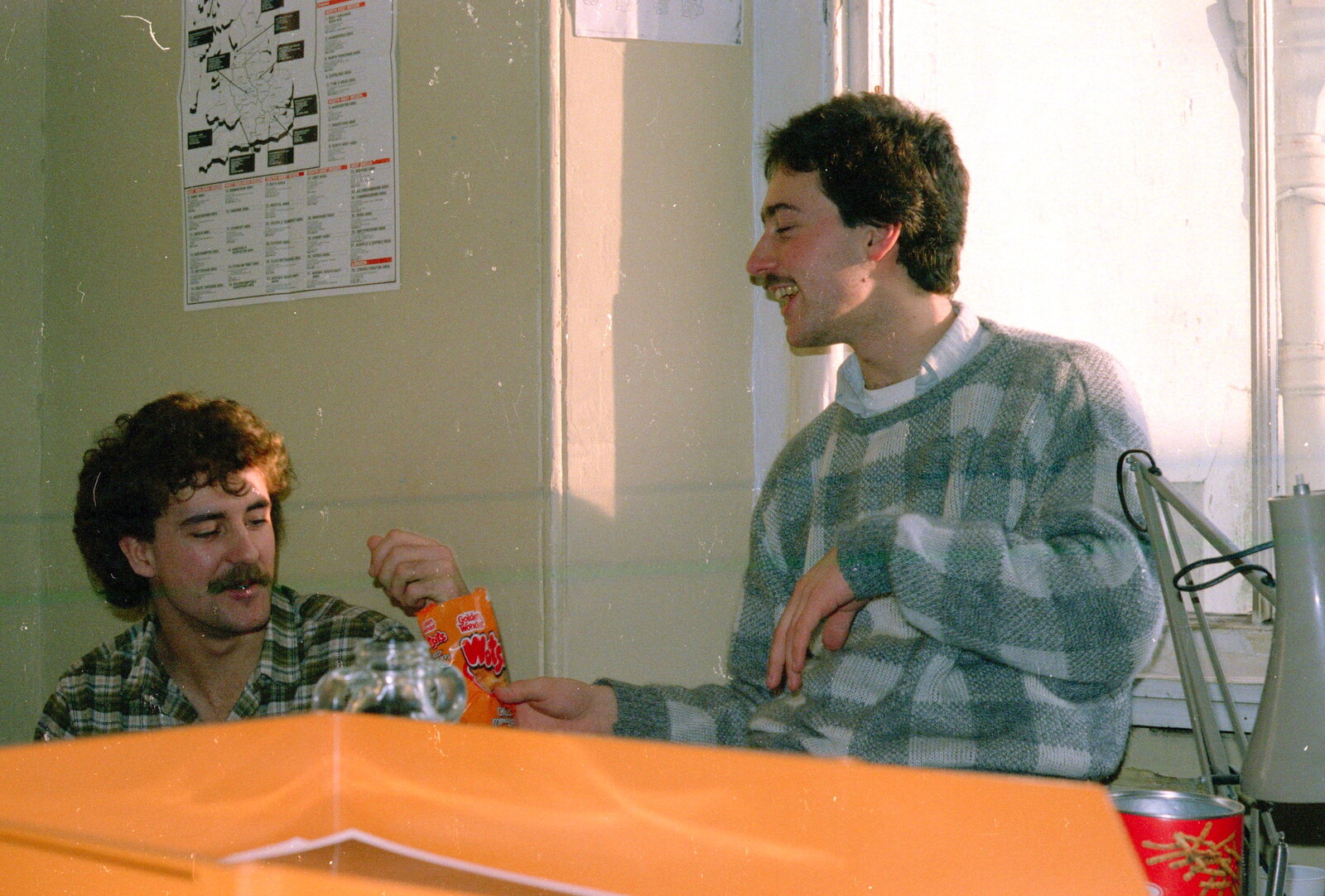 Mark offers Sam Kennedy a bag of Wotsits from Uni: The Fly Christmas Party and BABS Panto, Plymouth Polytechnic, Devon - December 11th 1985