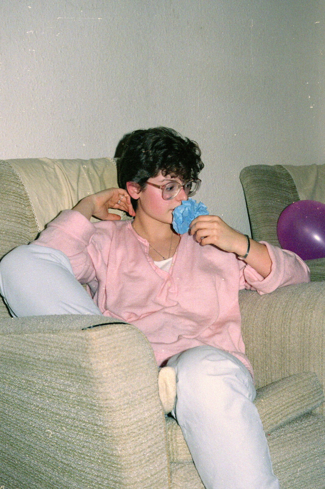 Barbara sniffs a paper flower from Uni: Beaumont Street Decorations and Water Fight, Plymouth - 14th December 1985