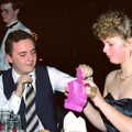 Andy Bray inspects a paper hat, Uni: BABS Christmas Ball and a Beaumont Street Party, Plymouth - 16th December 1985