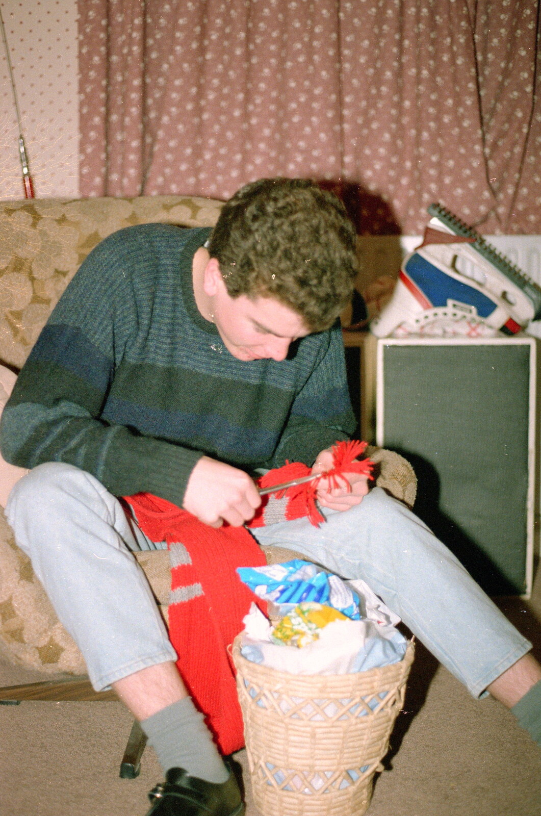 Jon snips up some knitwear from Ford Cottage Pre-Christmas, Barton on Sea, Hampshire - 19th December 1985