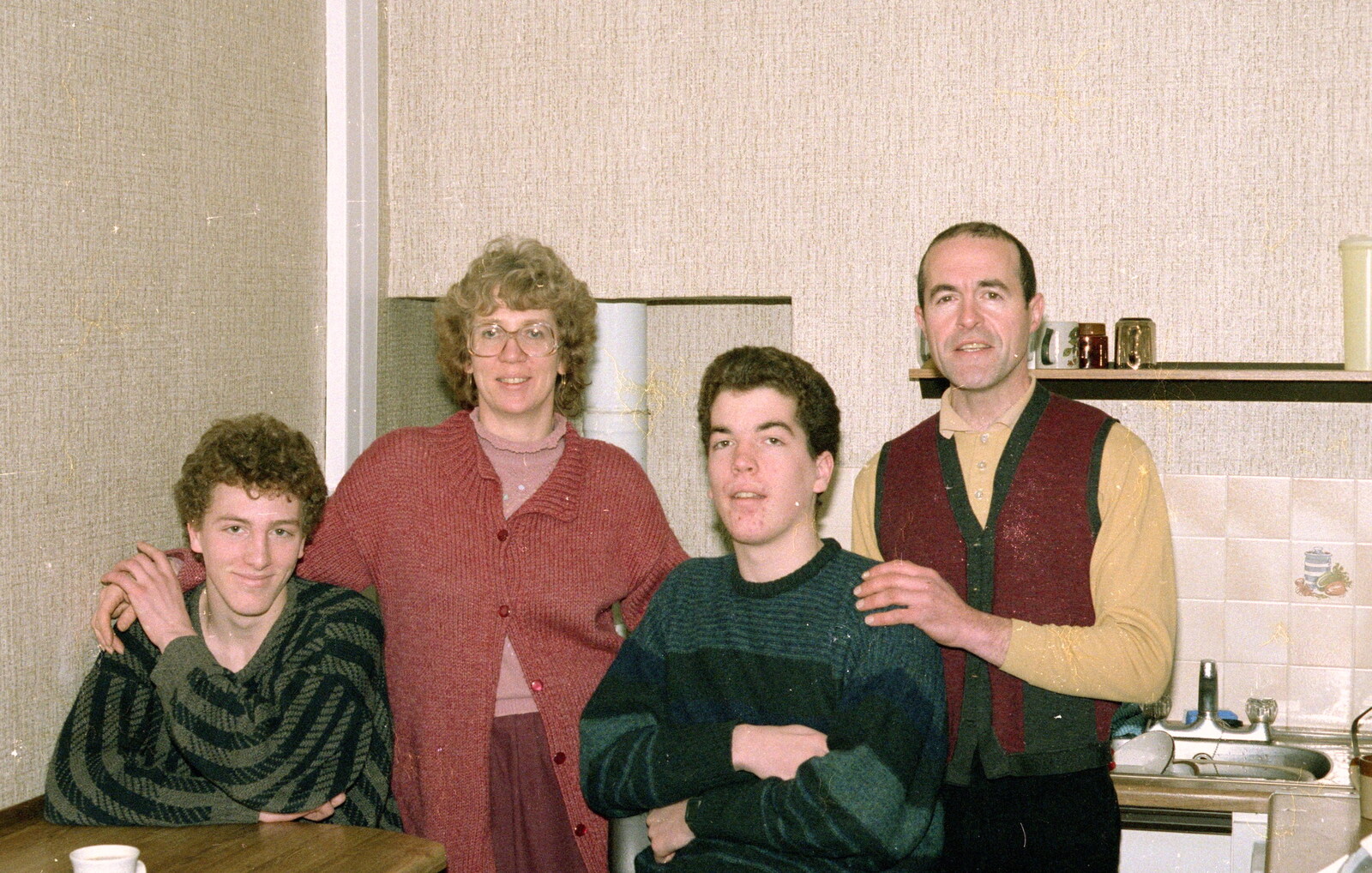 Jeremy, Anne, Jon and David in the kitchen from Ford Cottage Pre-Christmas, Barton on Sea, Hampshire - 19th December 1985