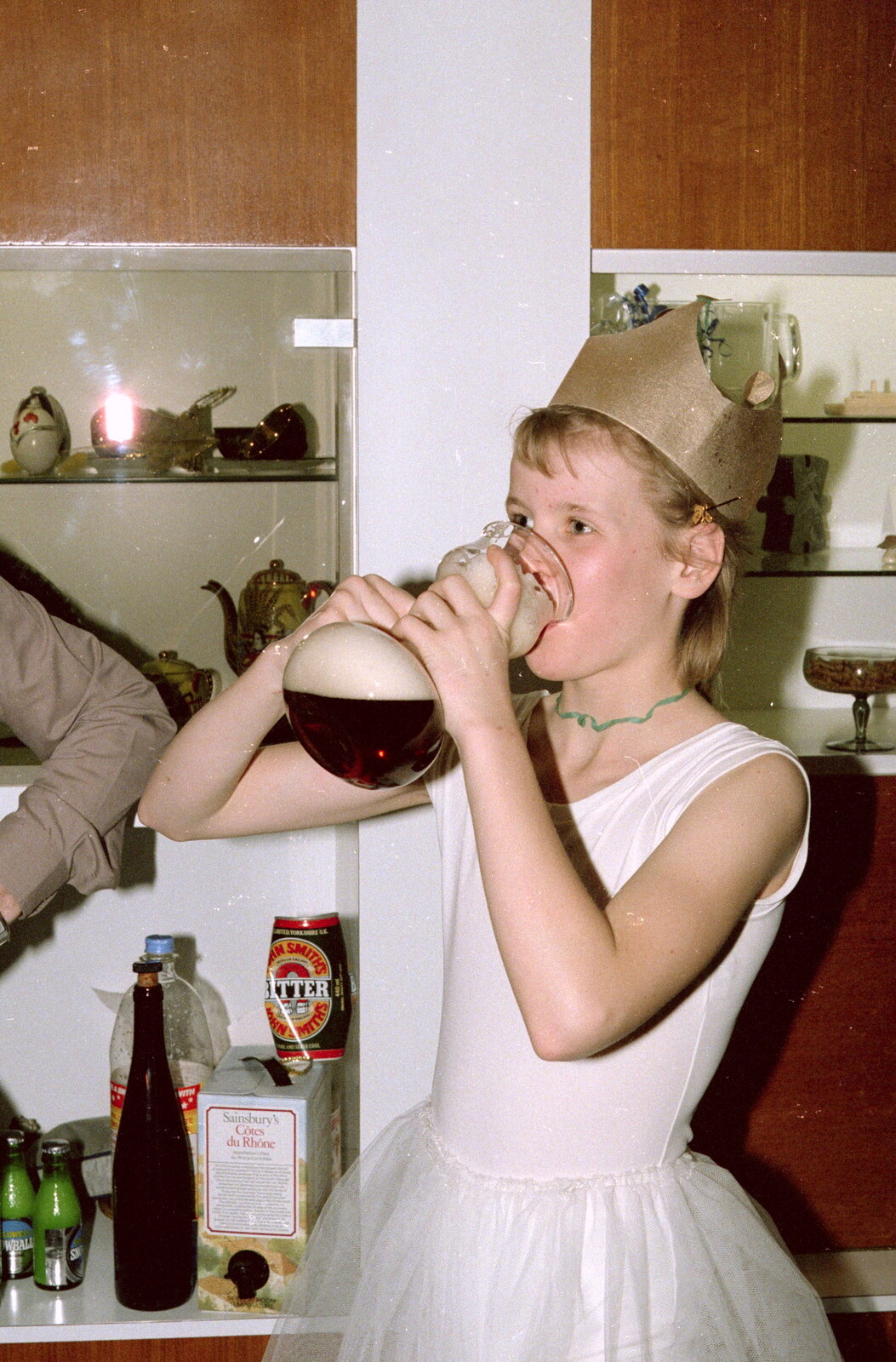 Alice drinks a bit of homebrew from New Year's Eve at Anna's, Walkford, Dorset - 31st December 1985