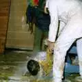 Unspeakable yellow goo is poured over a vitim, Uni: The Jazz RAG Hit Squad, Plymouth Polytechnic, Devon - 8th February 1986