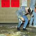A victim struggles to stand up under the weight of goo, Uni: The Jazz RAG Hit Squad, Plymouth Polytechnic, Devon - 8th February 1986