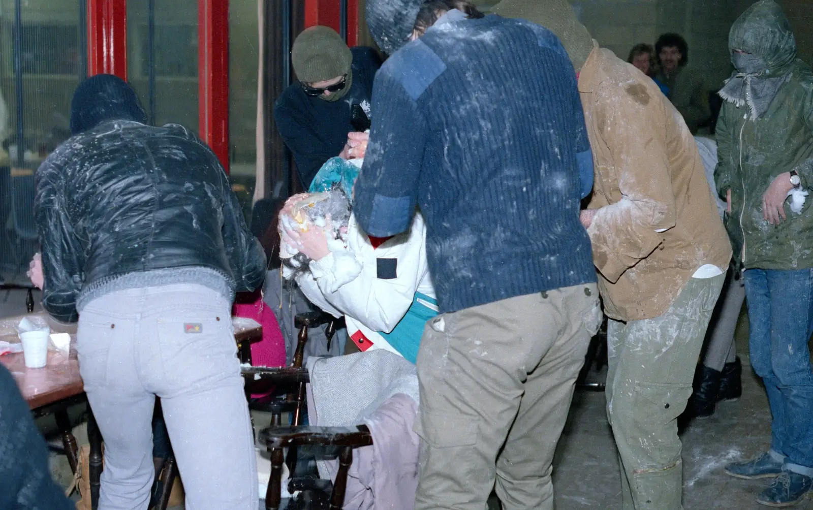 A victim cowers, from Uni: The Jazz RAG Hit Squad, Plymouth Polytechnic, Devon - 8th February 1986