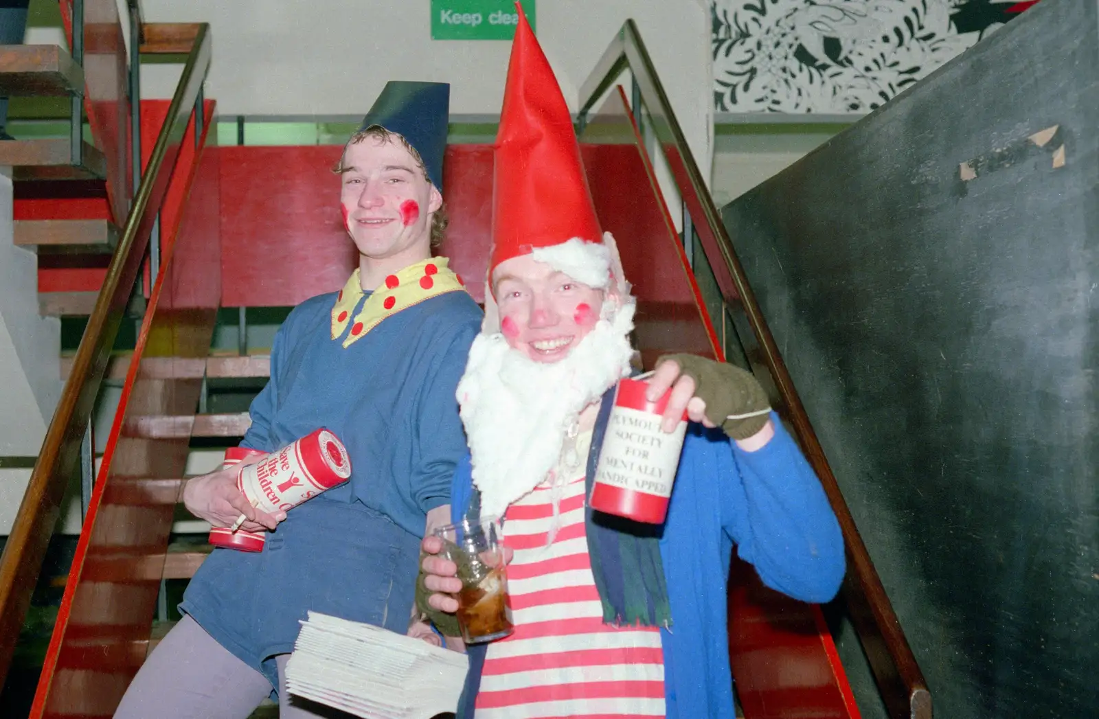 A couple of gnomes on the SU stairs, from Uni: The PPSU "Jazz" RAG Review and Charity Auction, Plymouth, Devon - 10th February 1986