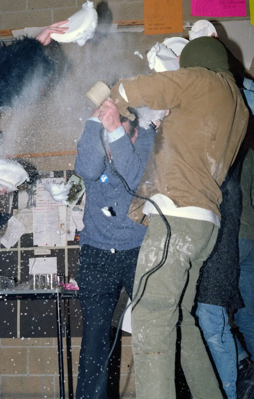 Roy Gardiner tries to protect himself, from Uni: The PPSU "Jazz" RAG Review and Charity Auction, Plymouth, Devon - 10th February 1986