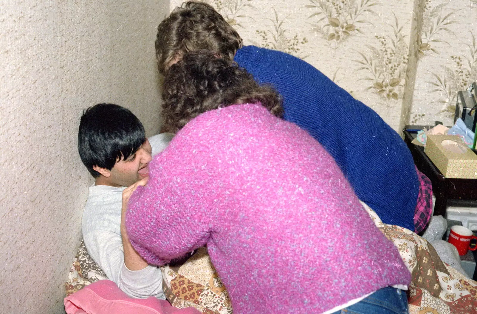 Frank is bundled onto Nosher's bed, from Uni: RAG Week Abseil, Hitch Hike, and Beaumont Street Life Plymouth, Devon - 13th February 1986