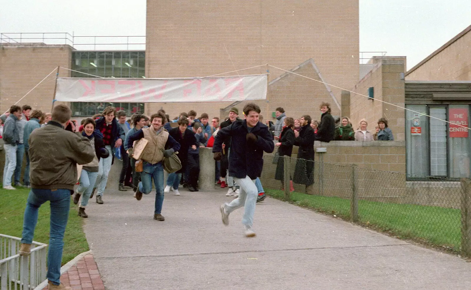 The charity hitch-hikers leg it, from Uni: RAG Week Abseil, Hitch Hike, and Beaumont Street Life Plymouth, Devon - 13th February 1986