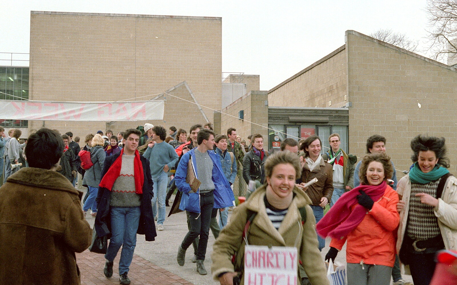A pile of students head out from the SU from Uni: RAG Week Abseil, Hitch Hike, and Beaumont Street Life Plymouth, Devon - 13th February 1986