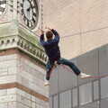 An abseiler hangs around near the clock tower, Uni: RAG Week Abseil, Hitch Hike, and Beaumont Street Life Plymouth, Devon - 13th February 1986