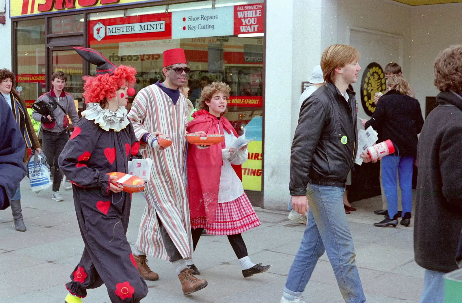 John Stuart in the background roams around with the SUTV camera, from Uni: PPSU "Jazz" RAG Street Parade, Plymouth, Devon - 17th February 1986